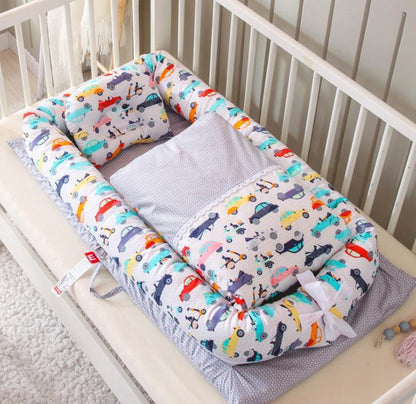 CuddleNest Portable Baby Crib